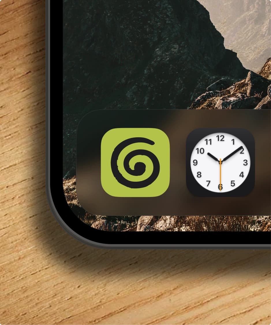 An iPhone home screen with the Granola app icon in the dock